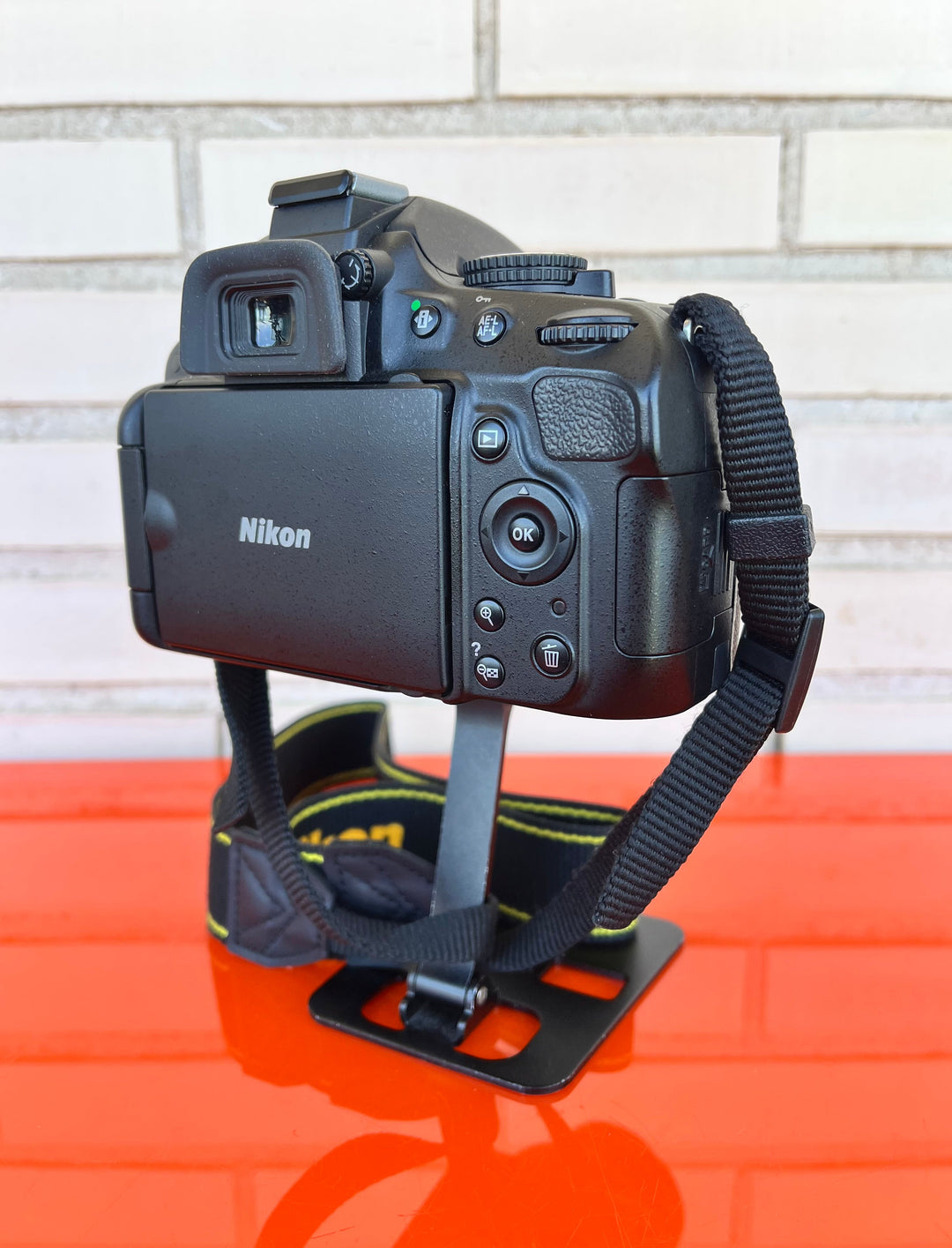Cámara Nikon con bolso y cargador - Videojuegoos