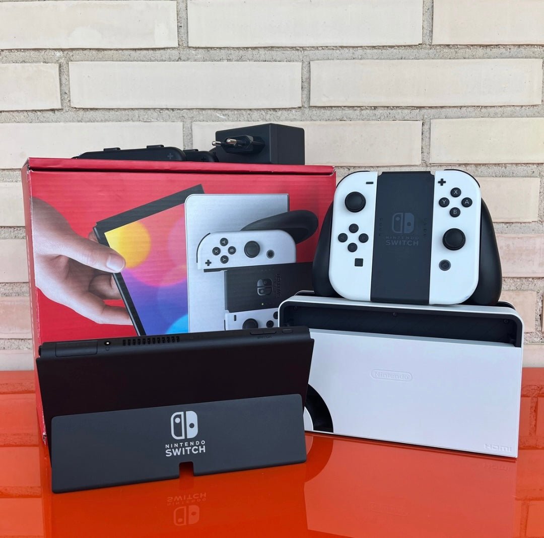 Nintendo Switch OLED blanca y negra - Videojuegoos