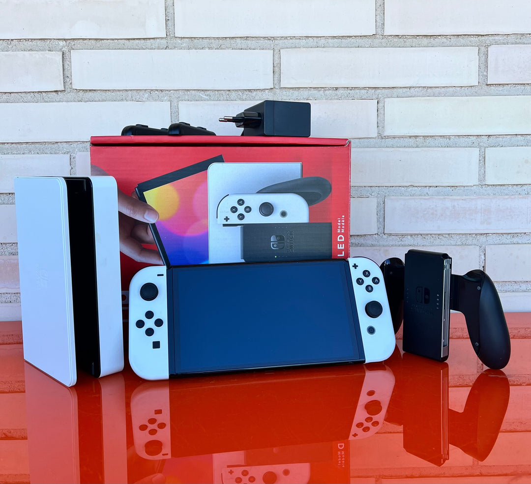 Nintendo Switch OLED Blanca y Negra - Videojuegoos