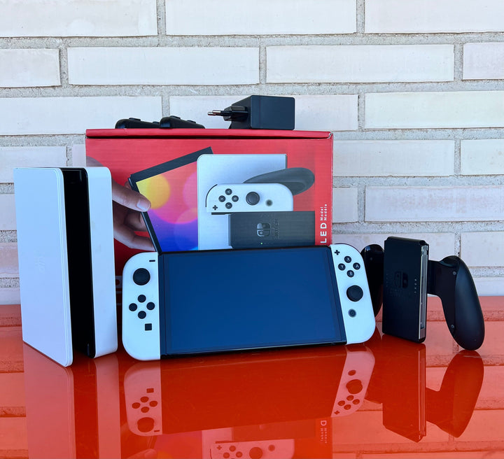 Nintendo Switch OLED Blanca y Negra - Videojuegoos