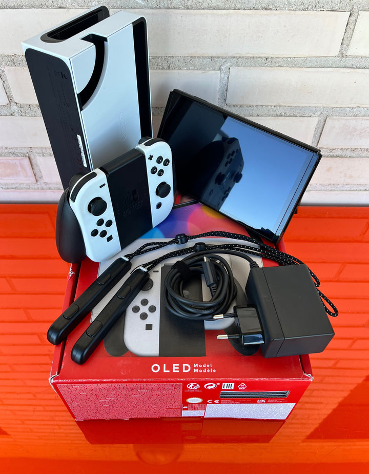 Nintendo Switch OLED Blanca y Negra - Videojuegoos