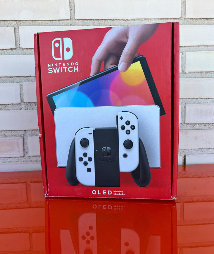 Nintendo Switch OLED Blanca y Negra - Videojuegoos