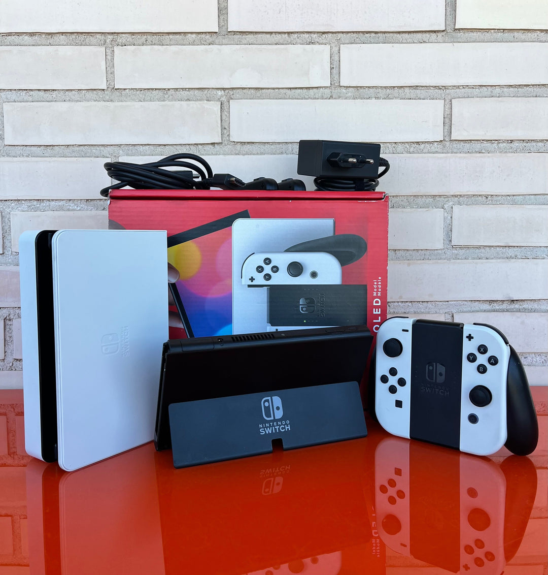 Nintendo Switch OLED Blanca y Negra - Videojuegoos