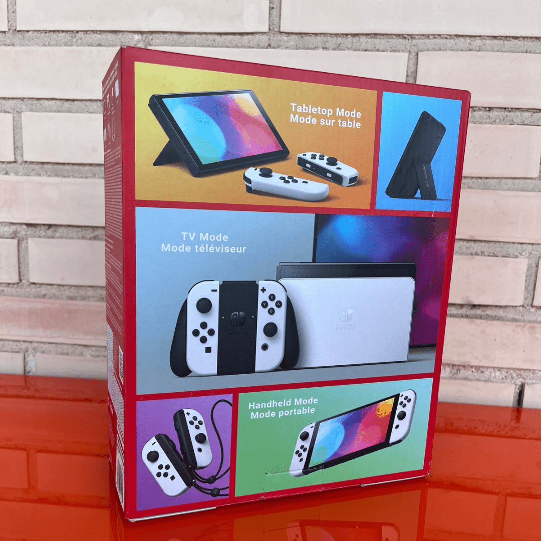 Nintendo Switch OLED blanca y negra - Videojuegoos