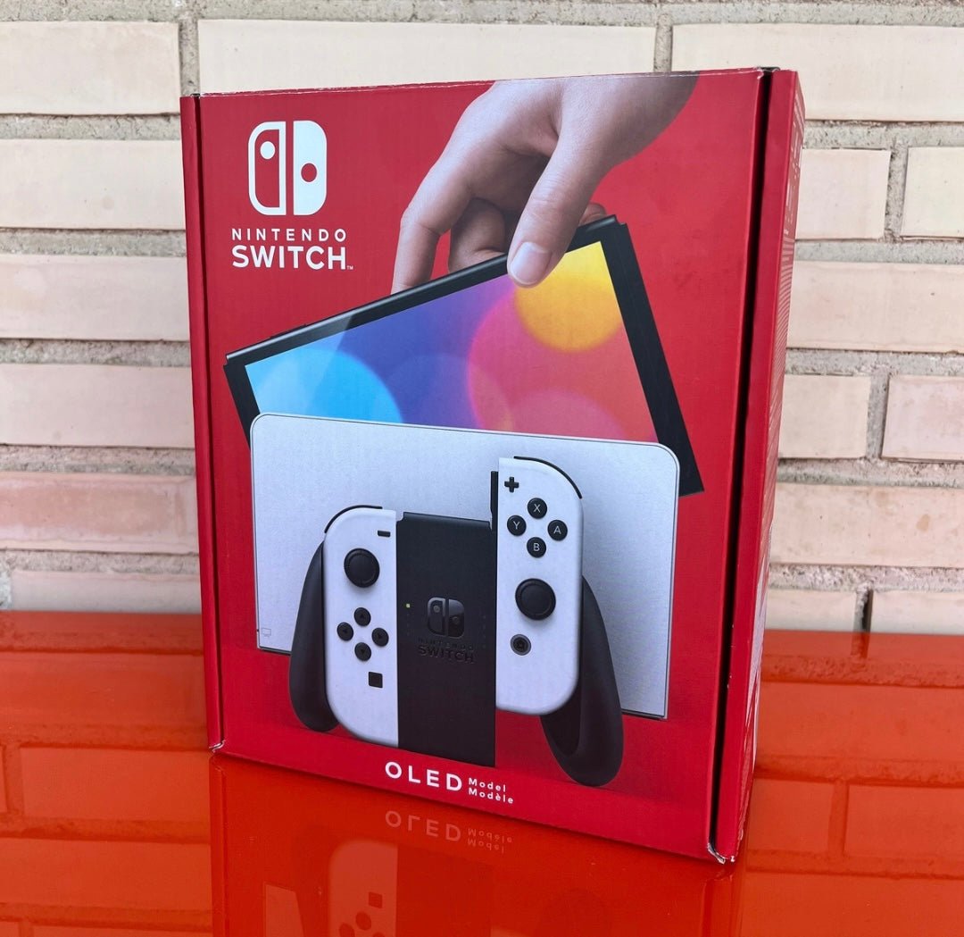 Nintendo Switch OLED blanca y negra - Videojuegoos