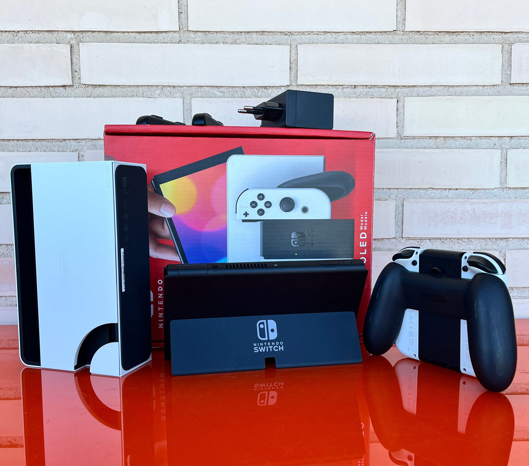 Nintendo Switch OLED Blanca y Negra - Videojuegoos
