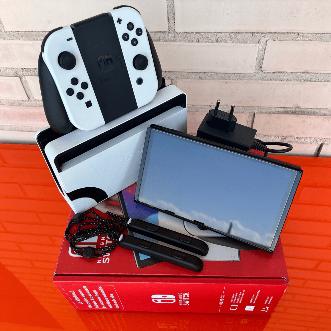 Nintendo Switch OLED blanca y negra - Videojuegoos