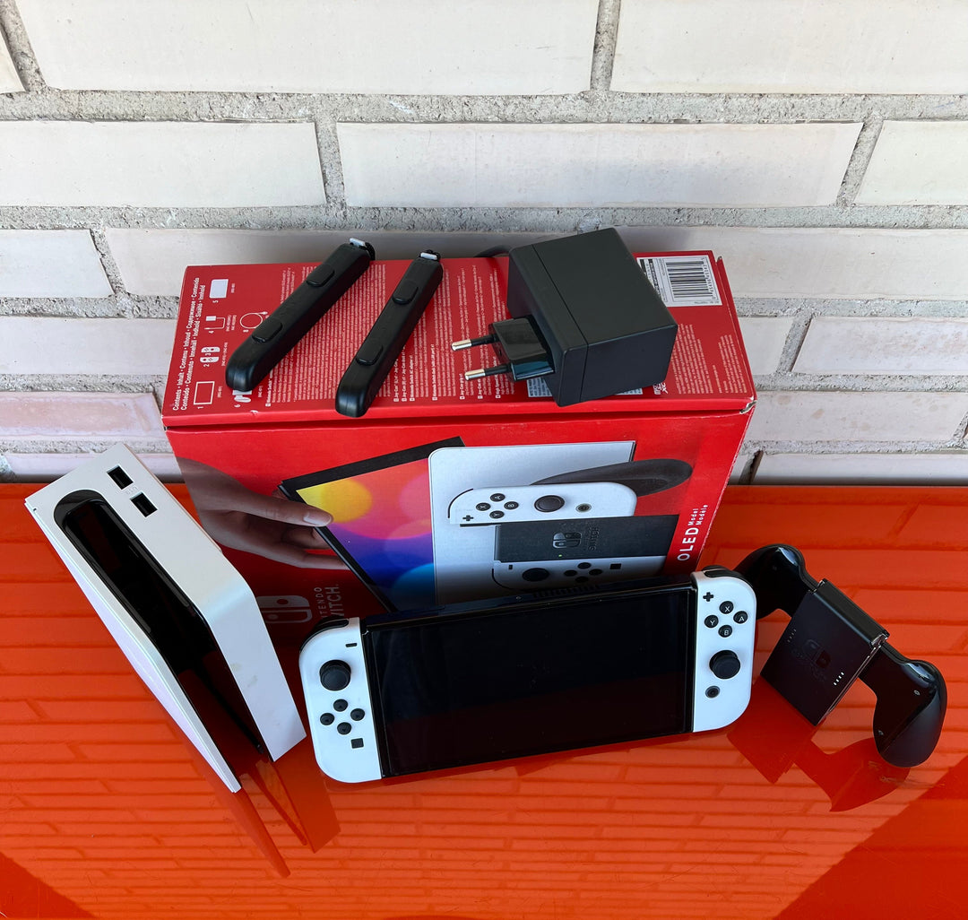 Nintendo Switch OLED Blanca y Negra - Videojuegoos