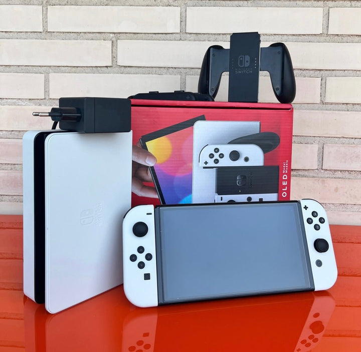 Nintendo Switch OLED blanca y negra - Videojuegoos