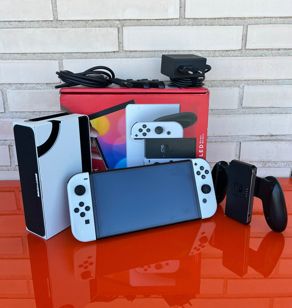 Nintendo Switch OLED Blanca y Negra - Videojuegoos