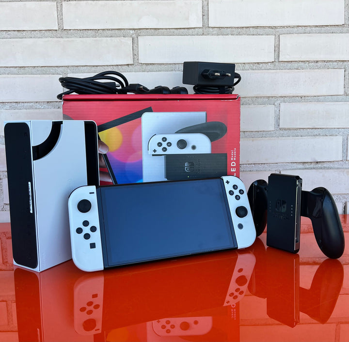 Nintendo Switch OLED Blanca y Negra - Videojuegoos